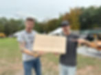 Morgan and Stone at maker camp with live slab carve done on a onefinity cnc